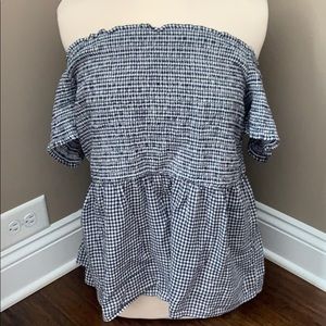 Off the shoulder plaid shirt